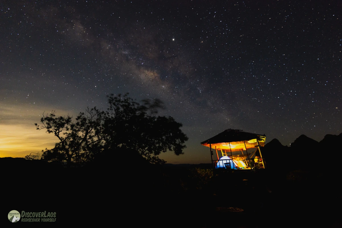 Pha Daeng Viewpoint in Nong Khiaw at night with the milky way.