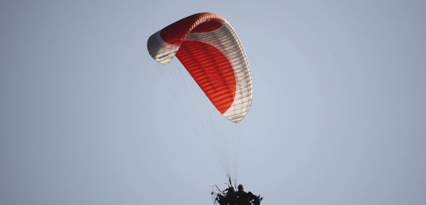 Sunset Paramotor Flying Over Vang Vieng